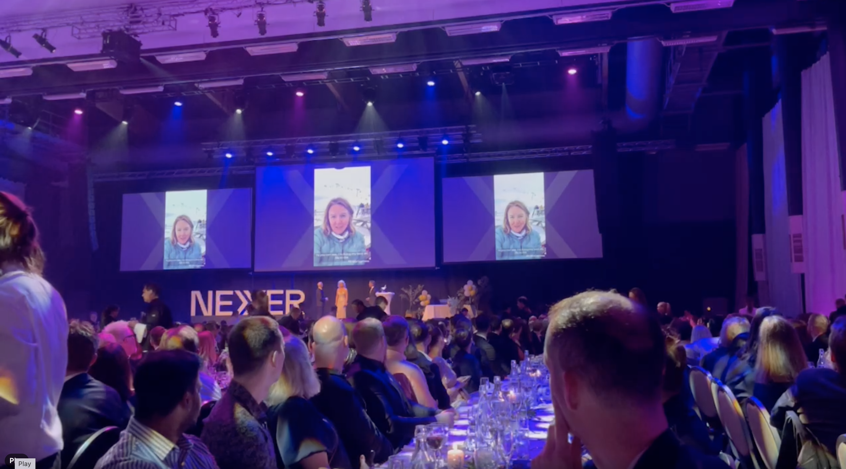 Hilary Stephenson onscreen at the Wow awards after winning 'Manager of the Year'