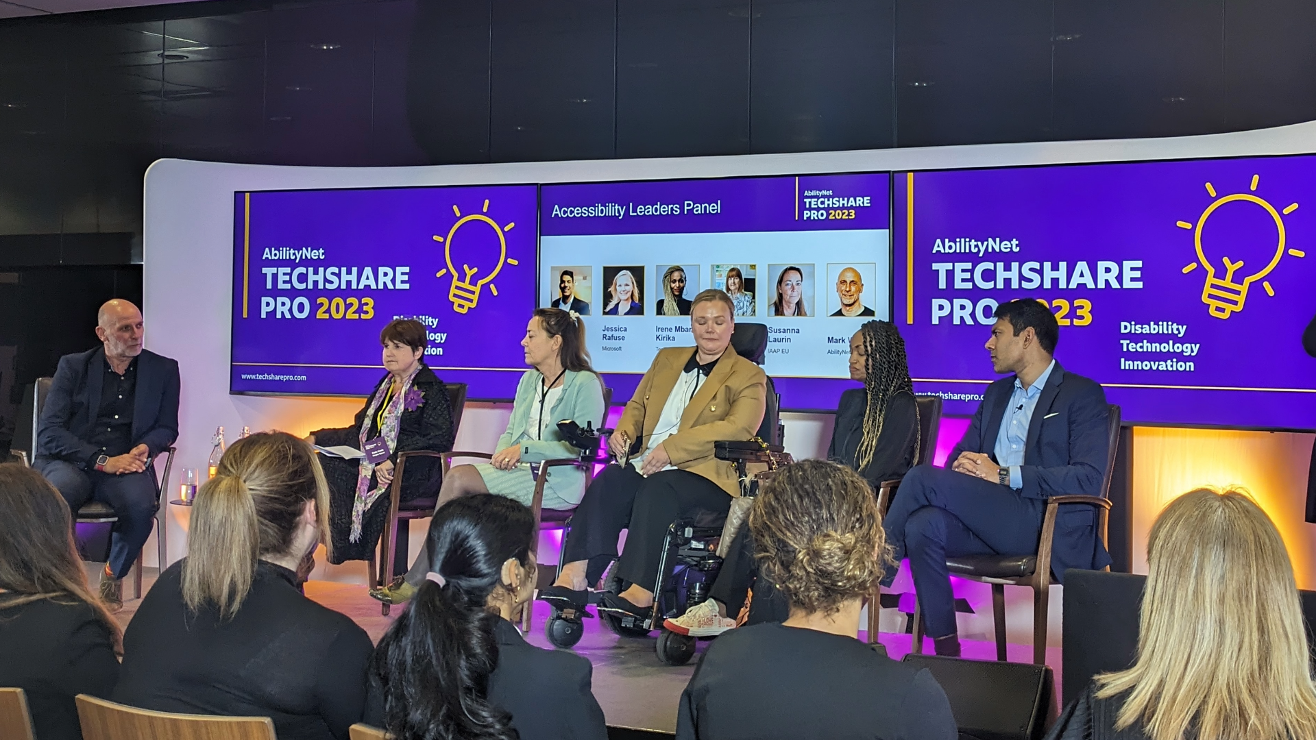 The Accessibility Tech Leaders Panel at the TechShare Pro 2023 seated onstage in front of an audience