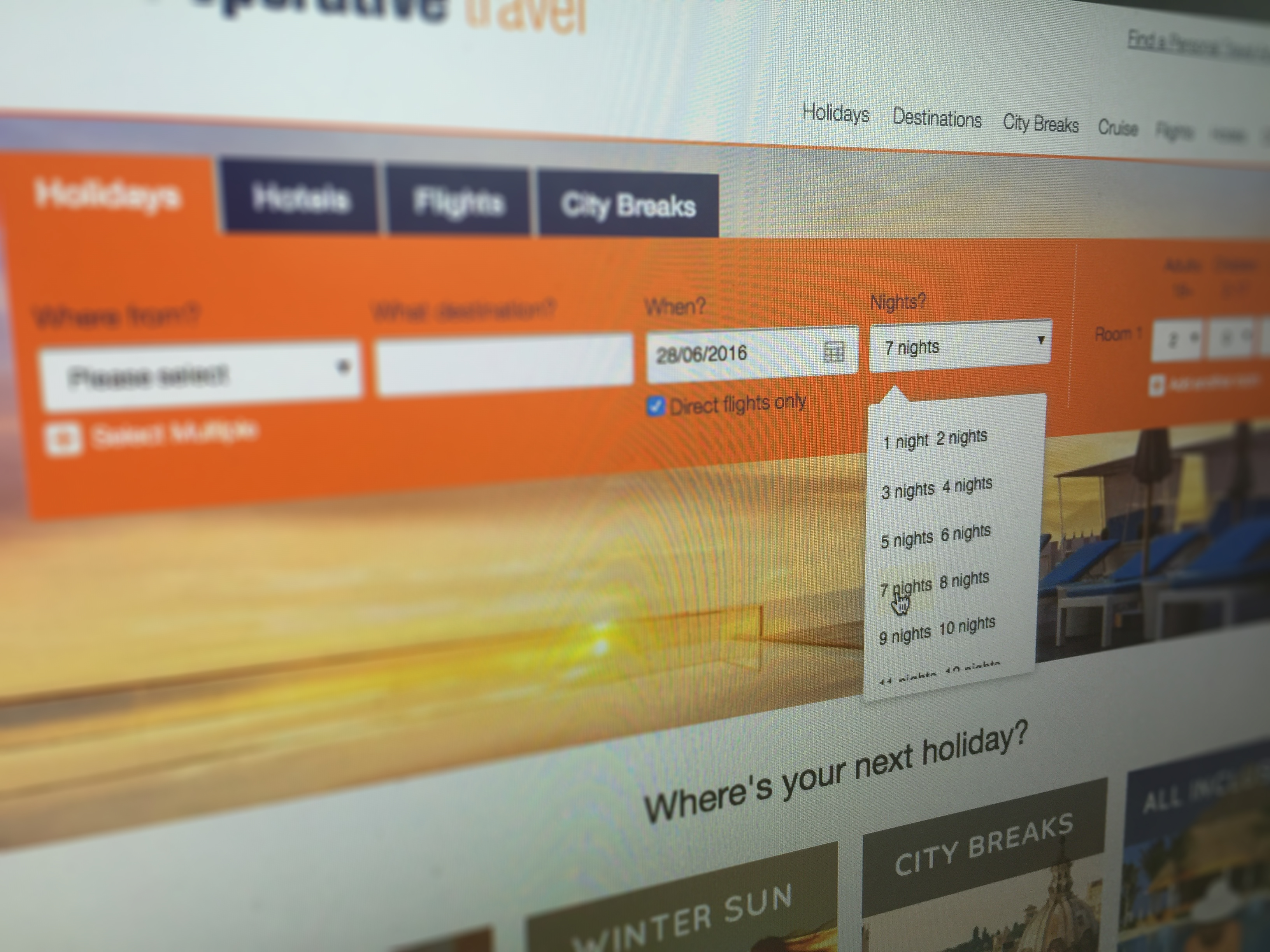 A blurred screenshot of the top part of a travel booking website